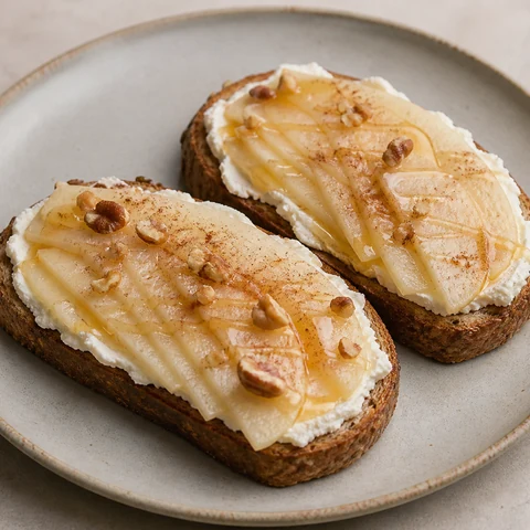 Wholegrain Toast with Ricotta and Pear. Ricotta spread thickly on wholegrain toast with sliced pear and a little honey. Five minutes, no pan.